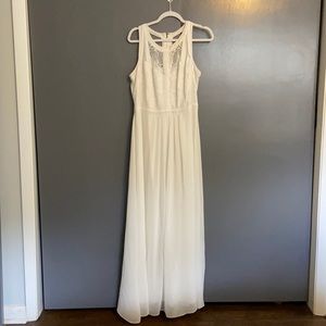 White flowy dress with lace detail top